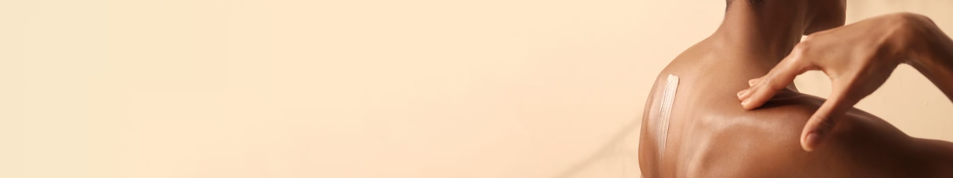 Model with moisturiser on there back.png