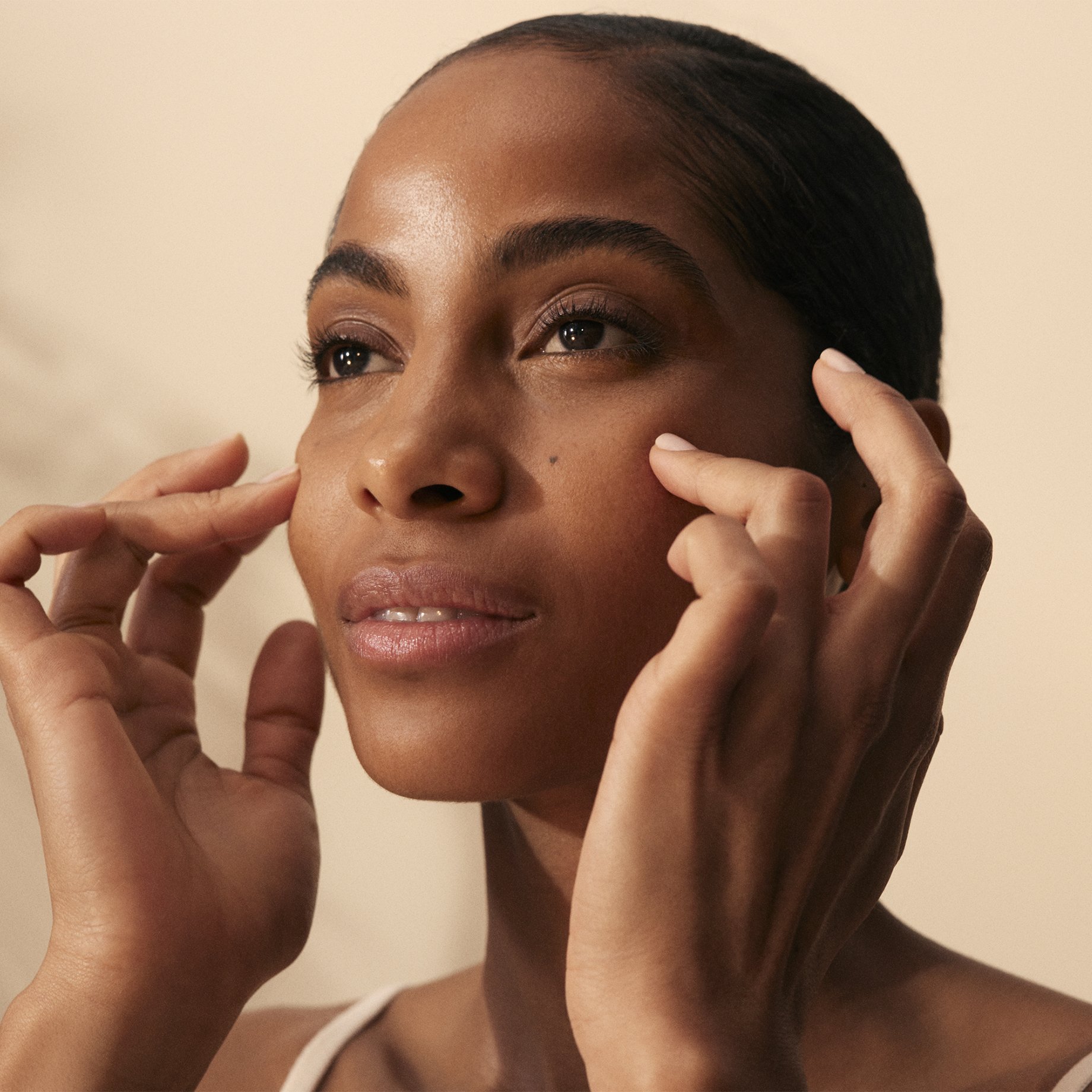 How to Apply Urjasara Serum Step 5: tap face