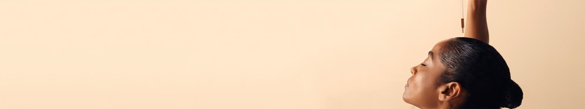 Model holding pipette with oil ontop of scalp.png